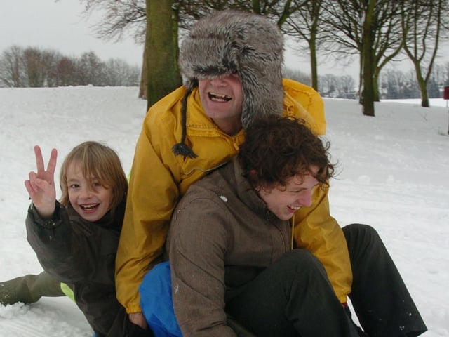 Three on a sledge: Pictured from left: Alfie Gardner, nine, Andy Skank and Jamie Holland. Thursday, 5th February 2009