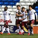 Sam Hoskins celebrates with his team-mates after scoring from the spot during Northampton's last meeting against Peterborough United, a 3-1 defeat in April 2021. (Photo by Pete Norton/Getty Images)