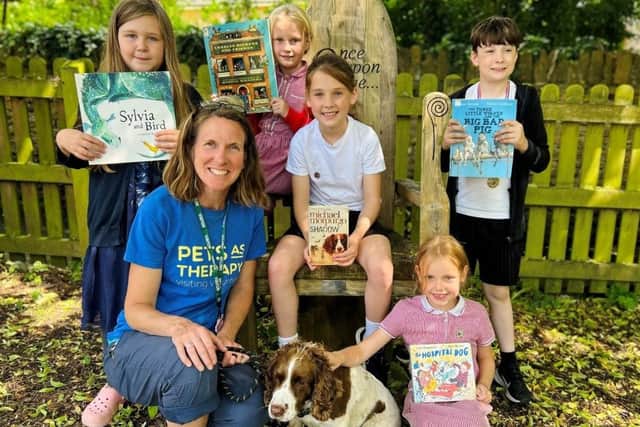 Chippy the dog and children from Pitsford Primary School