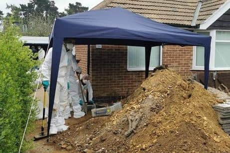 Forensic teams spent five days digging following the discovery of bones in ground outside a bungalow in Westone