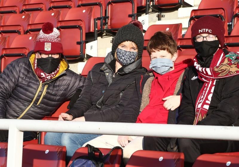 Northampton Town fans return to watch their team during the Sky Bet League One match between Northampton Town and Lincoln City at PTS Academy Stadium on December 19, 2020.