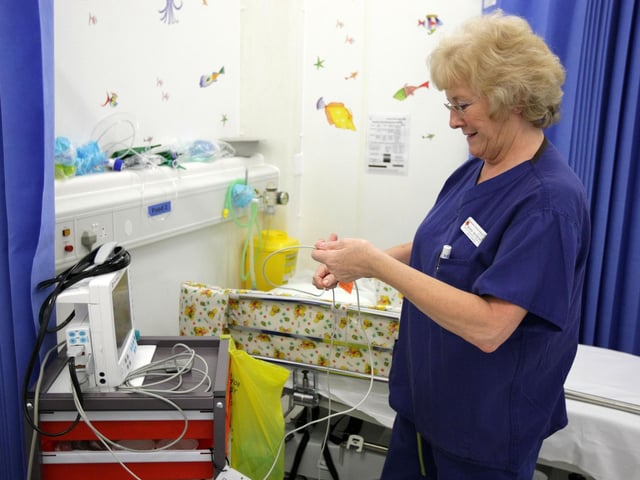 2010 - Moira Whyborn, senior recovery nurse, clearing away equipment after morning surgery at The Day Surgery Unit