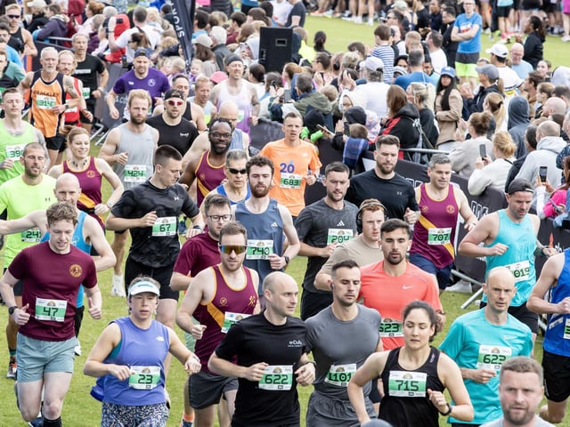 Hundreds of runners braved showers and wind to take on the race on Sunday (May 25), which started and finished at Sixfields stadium.