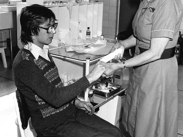 September 1980
Sister Marion Foster dresses an injury