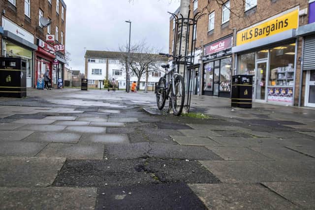 A petition with 261 signatures was presented to the full council, to ask for the slabbed pavement to be made safer and preferably resurfaced with tarmac. Photo: Kirsty Edmonds.