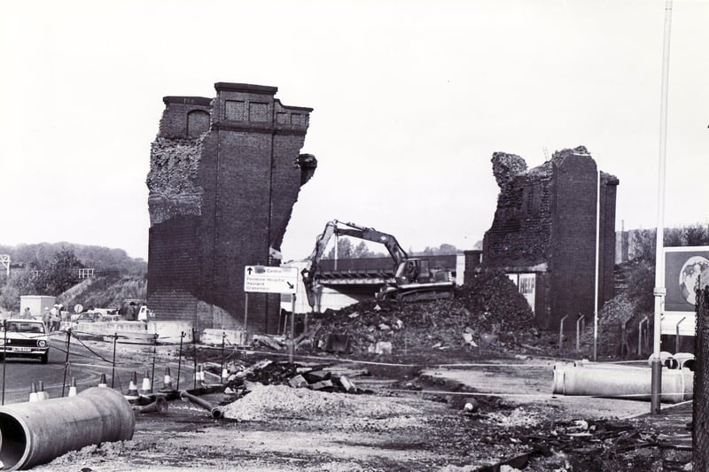 Pictured is the demolition of the old Horns Railway Bridge. Once part of a railway viaduct which straggled the main Derby Road, it was removed to make way for the new by-pass.