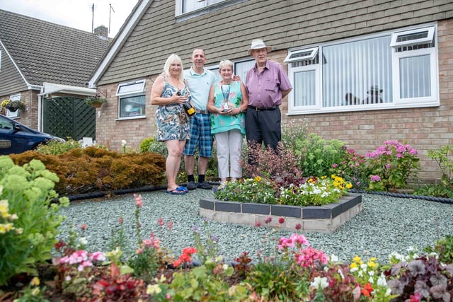 FRONT GARDENS WINNERS: This year saw a second win for the joint garden of Chris Westley and Alan and Carol Garrett in Reynard Way. The Garretts nearly had a double on their hands, coming a close second for their back garden.