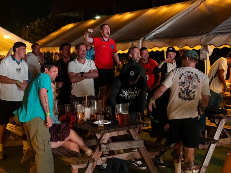 Football fans watching England vs Mexico in the garden of The Black Prince in Northampton. Photo by David Jackson.