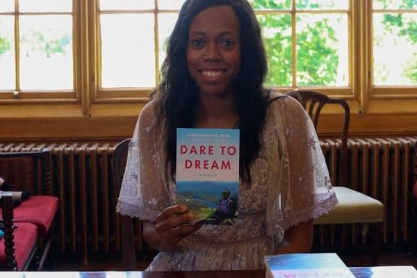 Lorraine Lewis with her new book - Dare to Dream
