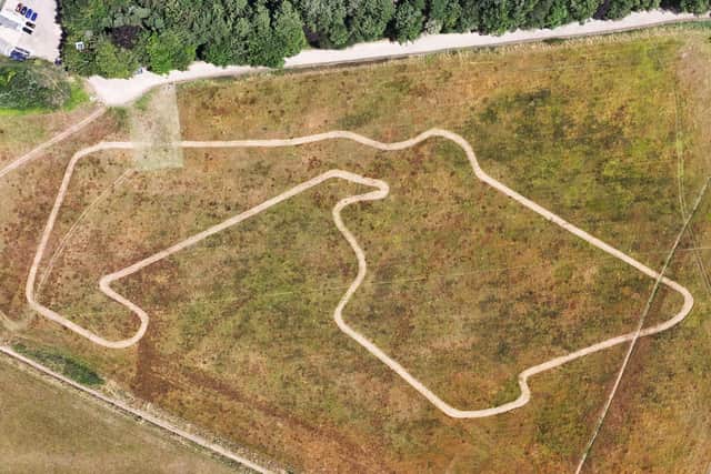 The wildflower meadow at Stowe Gardens neighbouring Silverstone now features a replica of the circuit in a wildflower meadow