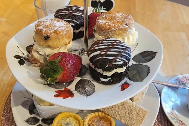 The tea room prides itself on welcoming anyone in, and is considered the "extended living room of the community".
