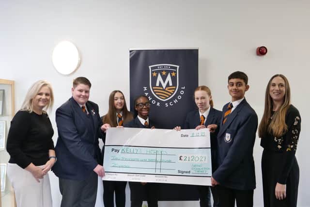 Charity CEO Sherry Adams with students and Amy Bradshaw Trust Mental Health and Wellbeing Lead