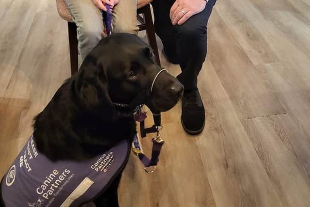 Emma's assistance dog, Barty.