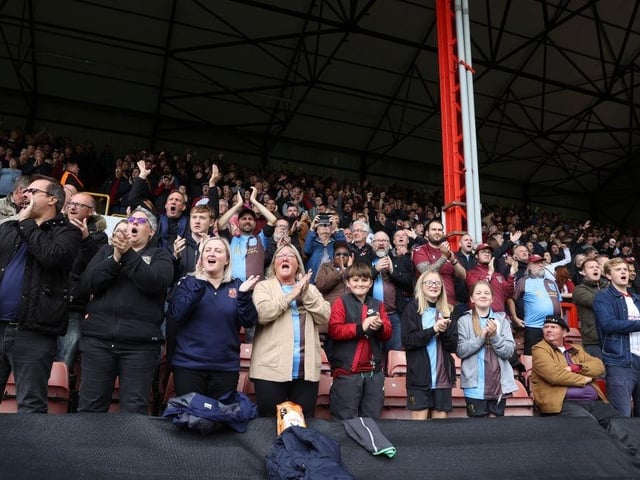 Northampton Town fans applaud as the teams enter the pitch prior to the Sky Bet League Two between Leyton Orient and Northampton Town at The Breyer Group Stadium on October 15, 2022.