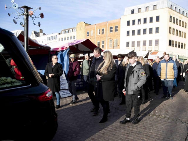 Hundreds gathered in the Market Square on Wednesday morning (December 7) to pay their respects to town legend Eamonn 'Fitzy' Fitzpatrick