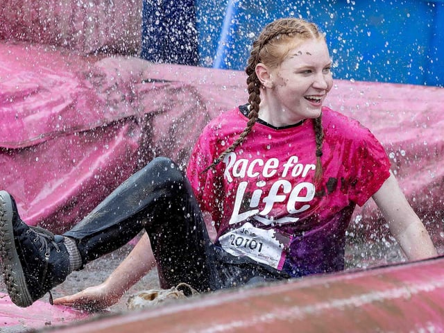 All smiles as participants tackled obstacles during Race for Life's Pretty Muddy on Saturday July 13, 2024 in Abington Park.