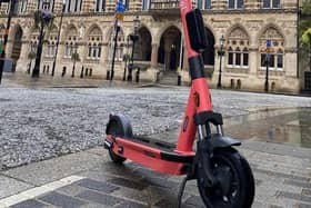 A man was left needing hospital treatment after a car knocked him off a Voi e-scooter.