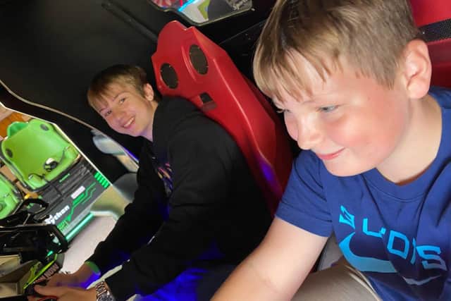 Dan and Jenny Crabb’s sons, Harry (blue t-shirt) and Thomas (black jumper).