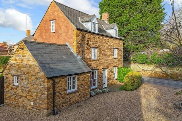 The stone cottage faces away from the main road and has heaps of charming original features