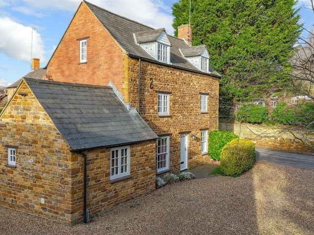 The stone cottage faces away from the main road and has heaps of charming original features