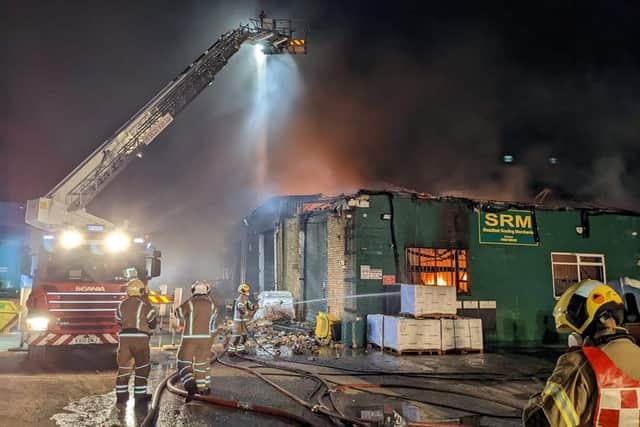 Firefighters on the scene of the blaze in Hardwater Road, Wollaston