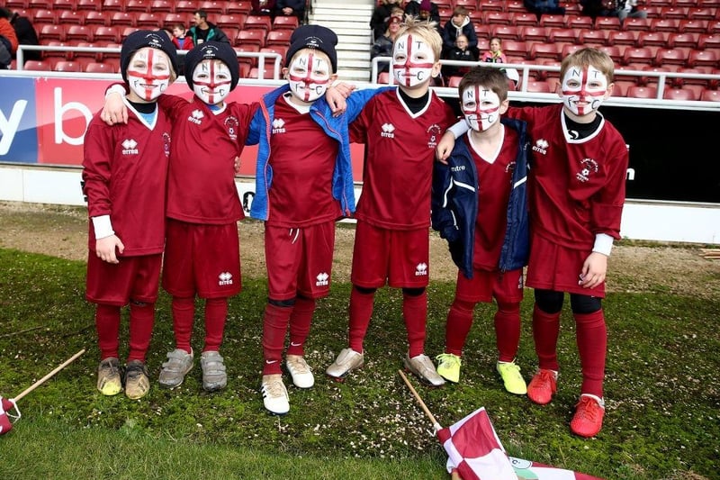 Young Northampton Town fans with painted faces prior to the Sky Bet League Two match between Northampton Town and Crewe Alexandra at PTS Academy Stadium on November 16, 2019.