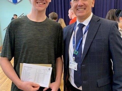 Alex pictured with Mr Frazer, Principal