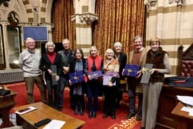 Volunteers receiving their long service awards at the Guildhall last week
