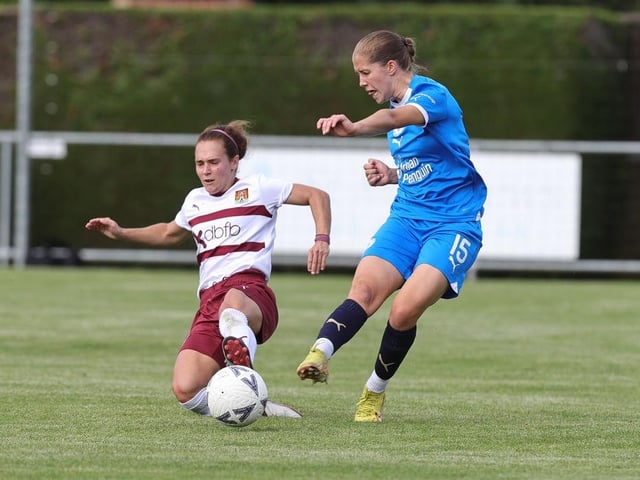 Jade Bell slides in on Poppie Brown