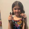 Libby has donated 12 inches of hair to charity.