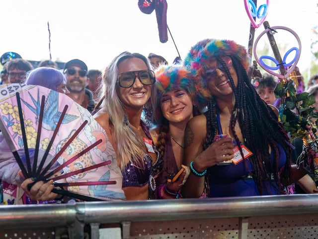 Festival goers watching acts perform on the Solasta Stage at the Shambala Festival. Photo by David Jackson.