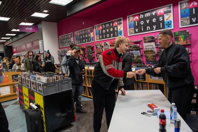 Fans queue to meet slowthai at HMV in Northampton to get copies of his third album Ugly signed.
