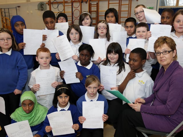 St James Primary School, Harlestone Road, Northampton. Julie Barke headteacher with children protesting about St James library cuts, have written 60 letters of objection. Pictured in 2011.