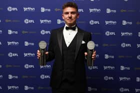 Sam Hoskins with his awards for Player of the Season and Team of the Season. Pictures: Andrew Fosker/Shutterstock