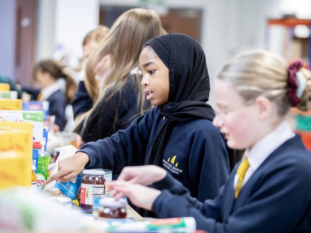 70 bags of food were packed by the 11 hardworking students, who learnt the importance of showing kindness and empathy to the community.