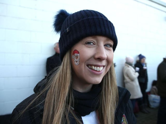 A Northampton Town fan with a painted face prior to the Sky Bet League Two match between Northampton Town and Forest Green Rovers at PTS Academy Stadium on December 14, 2019.