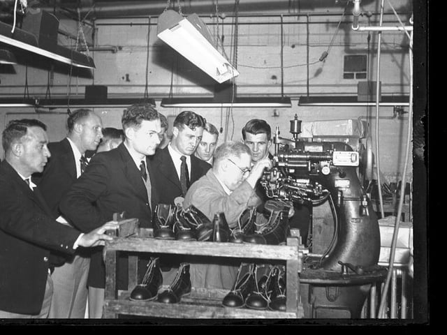 New Zealand Rugby Football Club Touring Team 1953-54 at a Northamptonshire boot factory