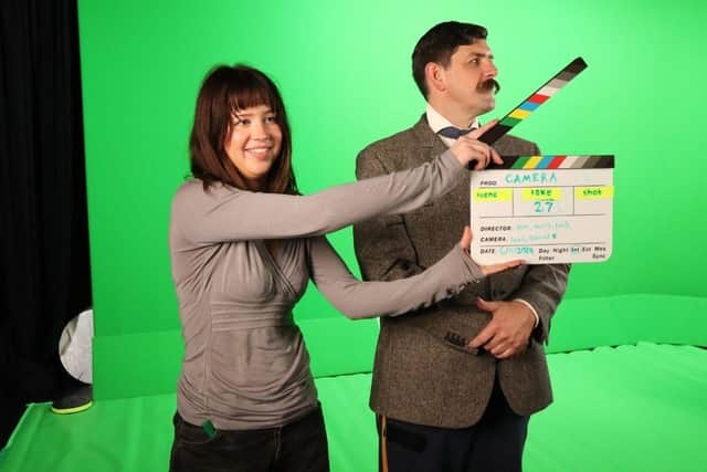 Student at the University of Northampton marks the last video take.