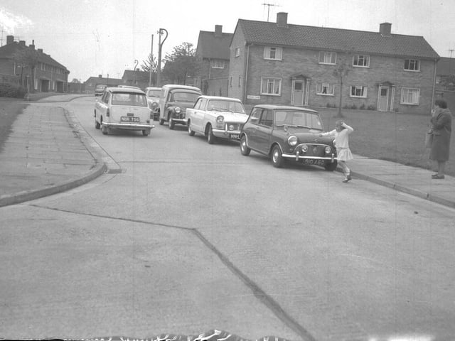 Traffic in streets near town centre, June 5, 1967