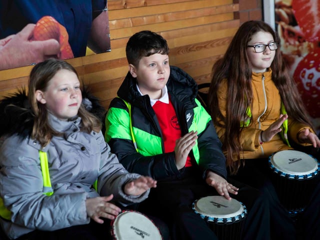 Abbey Primary School's choir and African drumming group took to Tesco Mereway on March 31, 2022 to raise money for the British Red Cross.