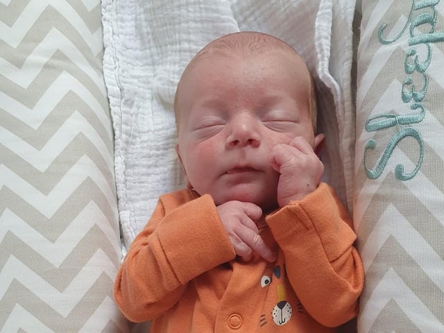 Reggie David Alan born on August 25 weighing 5lbs 4oz.