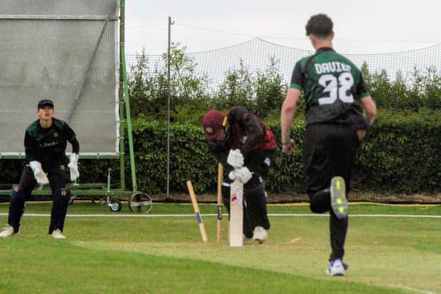 Not much doubt about that one... Overstone Park's Adam Davies bowls Kislingbury Temperance and Northants batter Rob Keogh (Picture: Finbarr Carroll)