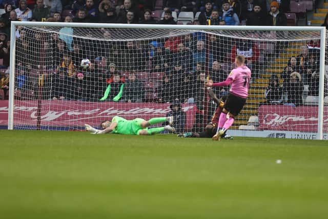 Mitch Pinnock slots in the opener. Pictures: Pete Norton
