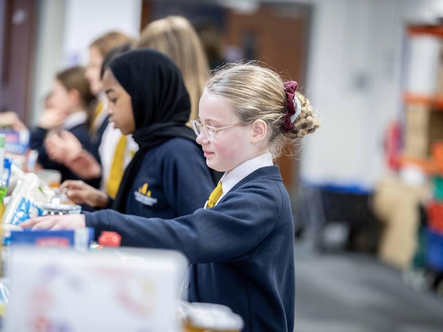70 bags of food were packed by the 11 hardworking students, who learnt the importance of showing kindness and empathy to the community.
