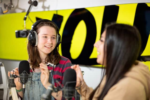 Gracie recording the podcast