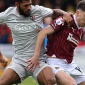 Kieron Bowie battles for possession during the Cobblers' clash with Exeter City at Sixfields on Saturday (Picture: Pete Norton)