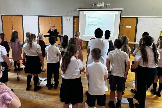 Schools pupils rehearsing