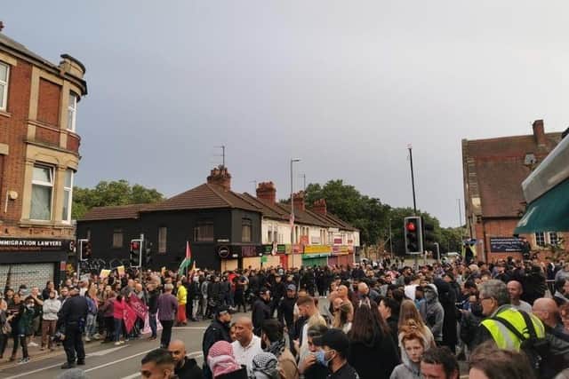 Hundreds of counter protesters took to Kettering Road to defend their community last night.