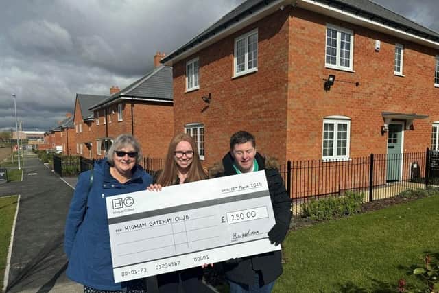 From left to right, Pip Willmott, Higham Gateway Club Secretary, joins Georgia Price, Sales Administrator at HarperCrewe, along with David Sharpe, Higham Gateway Club Committee Member, at the HarperCrewe Higham Ferrers development.
