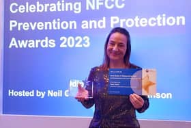 Prevention Team Leader, Tina Collett picking up the award for NFRS